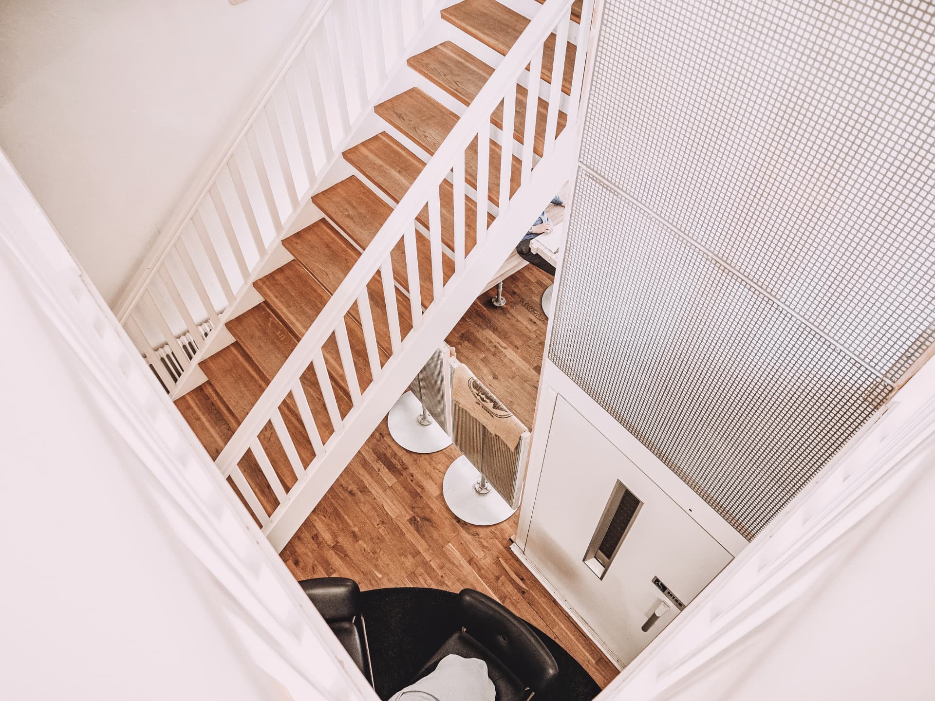Wooden staircase connecting the floors of the building